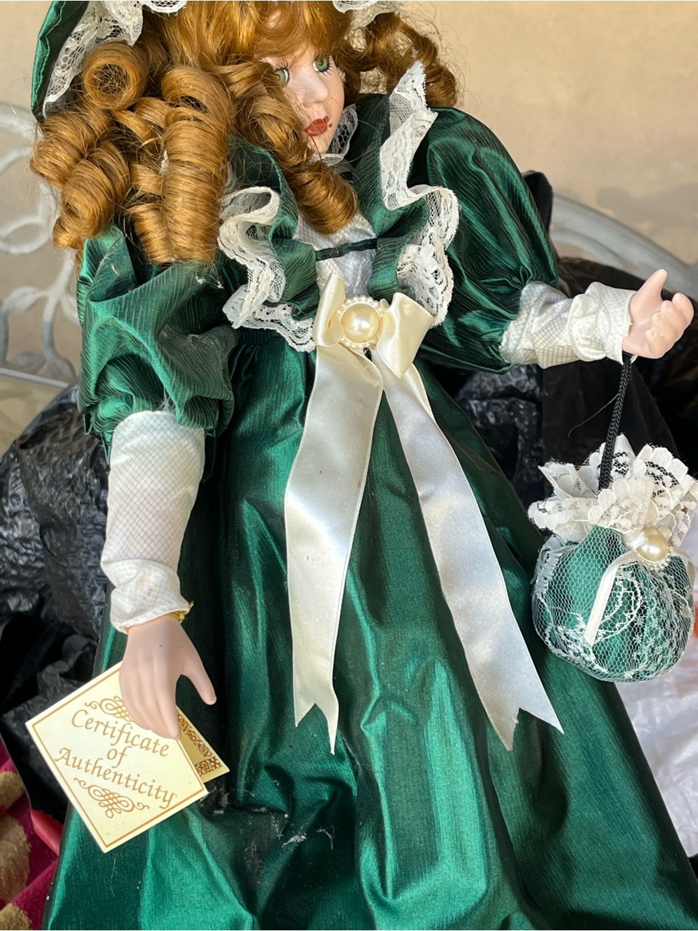 Porcelain Collector Doll in Emerald Green Satin Dress